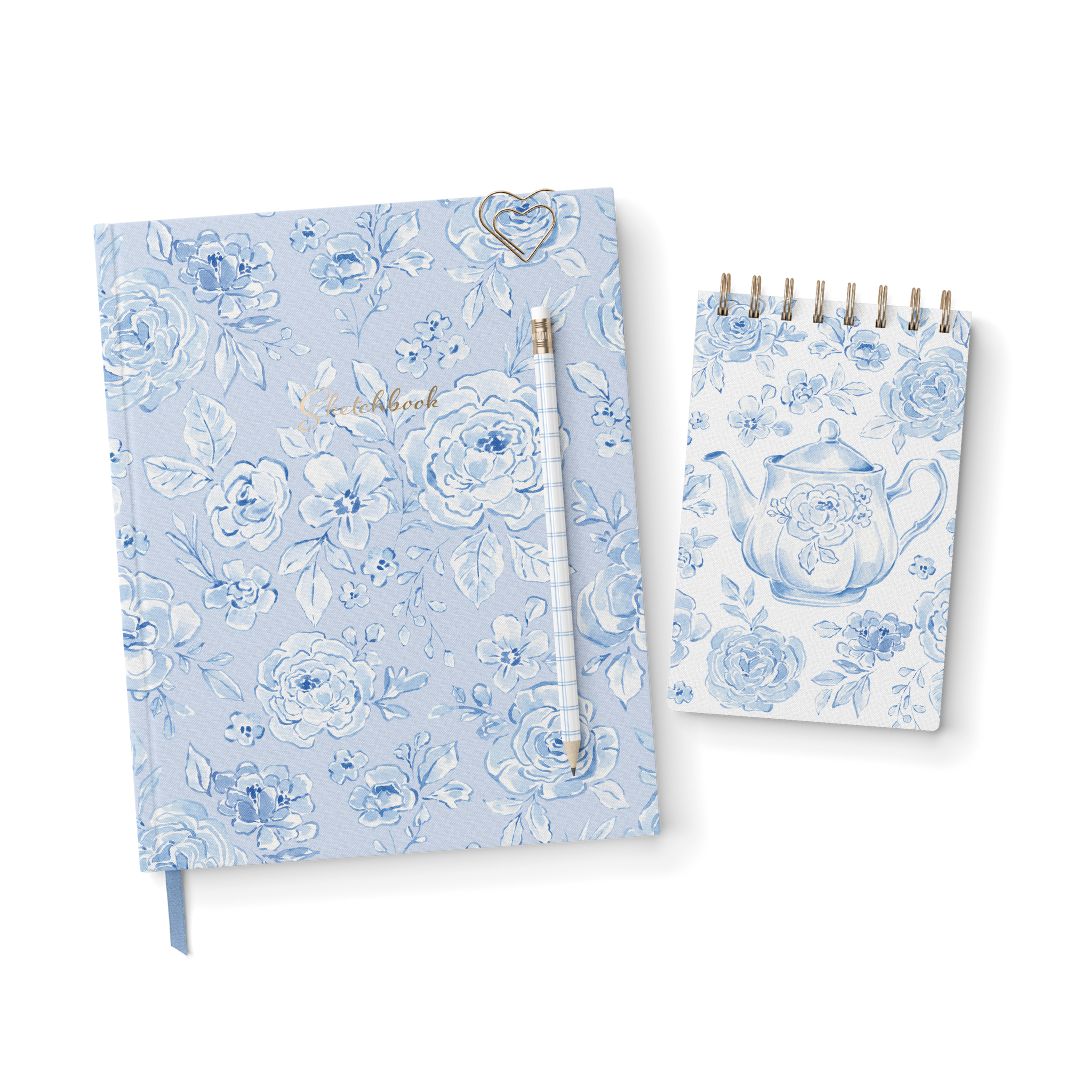 Set of two notebooks with floral designs on a white background