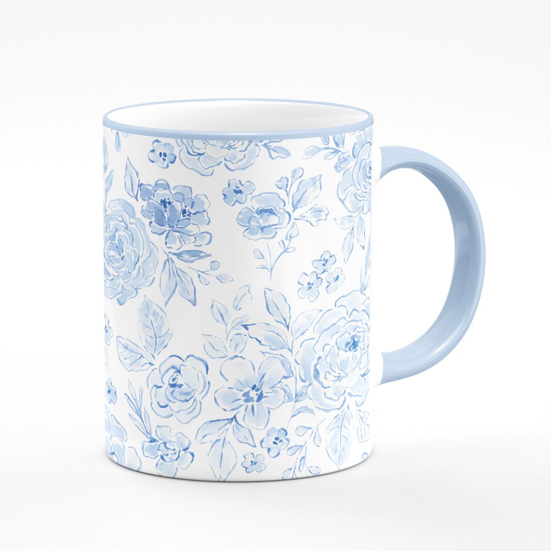 Mug with blue floral pattern on a white background