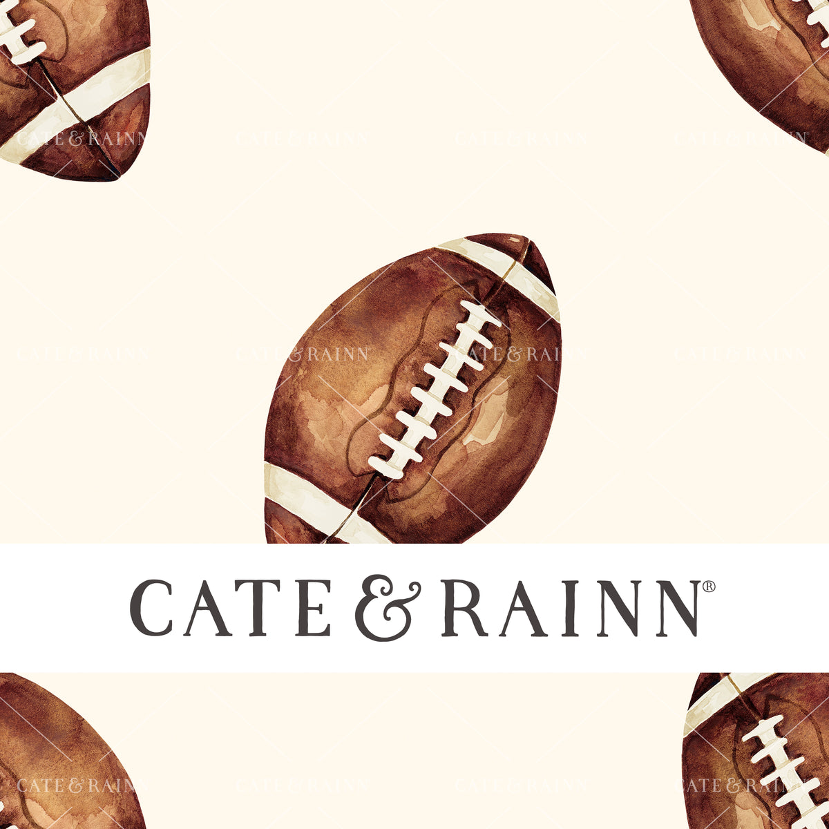 A hand-painted watercolor football design by Cate and Rainn®