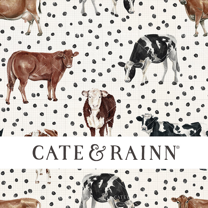 Pattern of watercolor cows on a cream background with black, hand-painted boho dots with a grid textured background, featuring the brand 'Cate &amp; Rainn'.