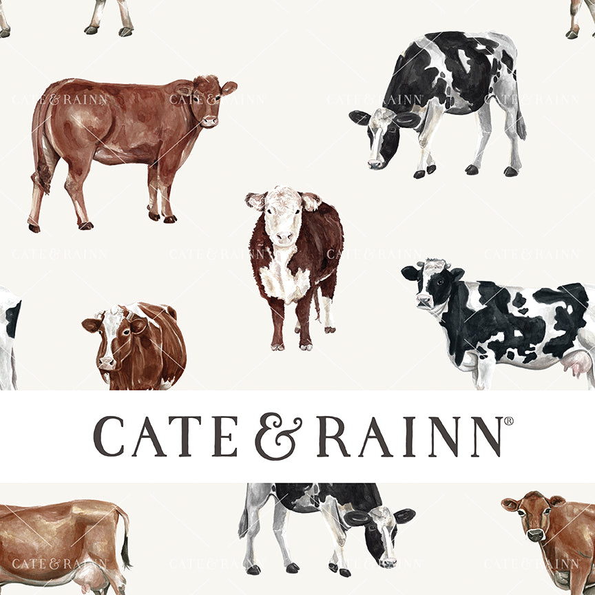 Pattern of watercolor cows on a cream background  featuring the brand 'Cate &amp; Rainn'.