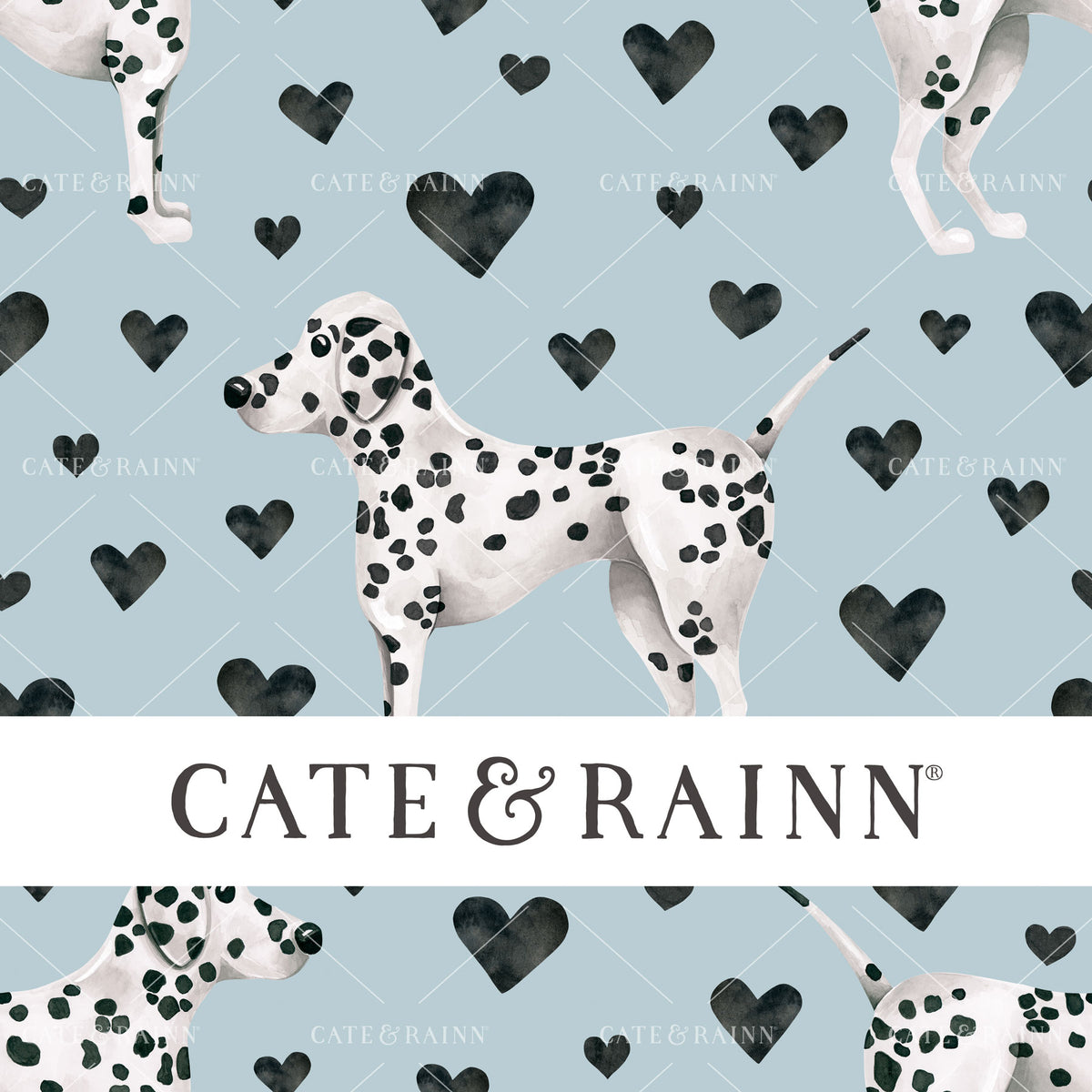 Patterned fabric with Dalmatian dogs and hearts on a blue background, featuring the brand 'Cate &amp; Rainn'.