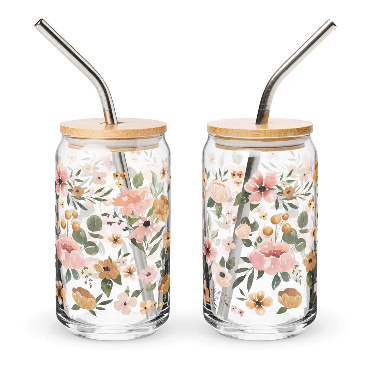 two glass jars with metal straws decorated with flowers